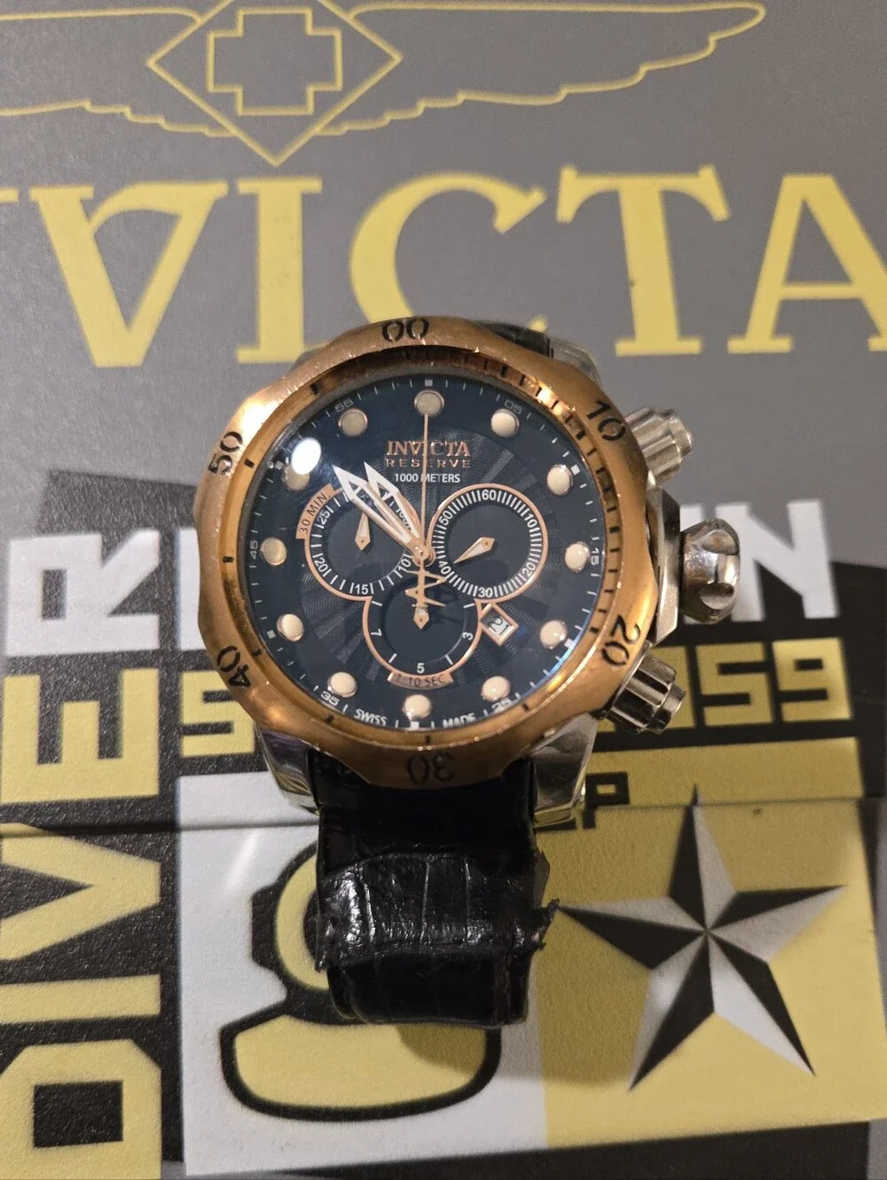 Invicta Gold and Black Chronograph Watch with Black Leather Strap. Needs Strsp